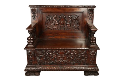 Lot 173 - A 19TH CENTURY ORNATELY CARVED MAHOGANY SETTLE