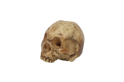 Lot 419 - A JAPANESE BONE 'SKULL' OJIME.