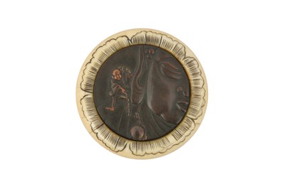 Lot 418 - λ A JAPANESE IVORY AND BRONZE KAGAMIBUTA NETSUKE.
