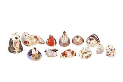 Lot 258 - A COLLECTION OF ELEVEN ROYAL CROWN DERBY PORCELAIN PAPERWEIGHTS