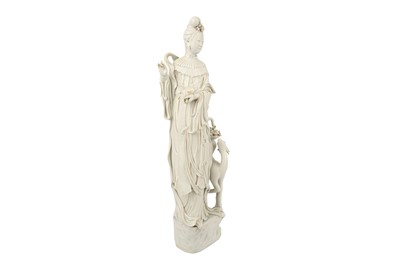 Lot 467 - A LARGE CHINESE BLANC-DE-CHINE FIGURE OF GUANYIN AND A DEER, 19TH CENTURY