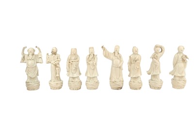 Lot 419 - A SET OF EIGHT CHINESE POTTERY FIGURES OF IMMORTALS, LATER BOXED