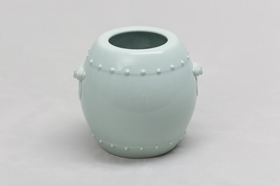 Lot 83 - A CHINESE CELADON-GLAZED DRUM-SHAPED VASE.