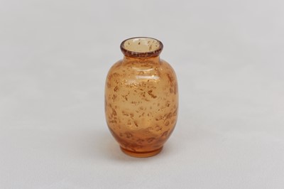 Lot 17 - A CHINESE GOLD-FLECKED AMBER GLASS JAR.
