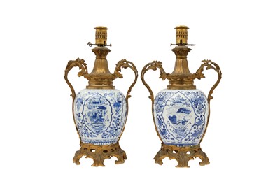 Lot 233 - A PAIR OF CHINESE ORMOLU-MOUNTED BLUE AND WHITE JARS.