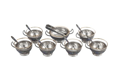 Lot 270 - A mid-20th century Persian (Iranian) silver and cloisonne enamel tea glass set, Rasht circa 1950