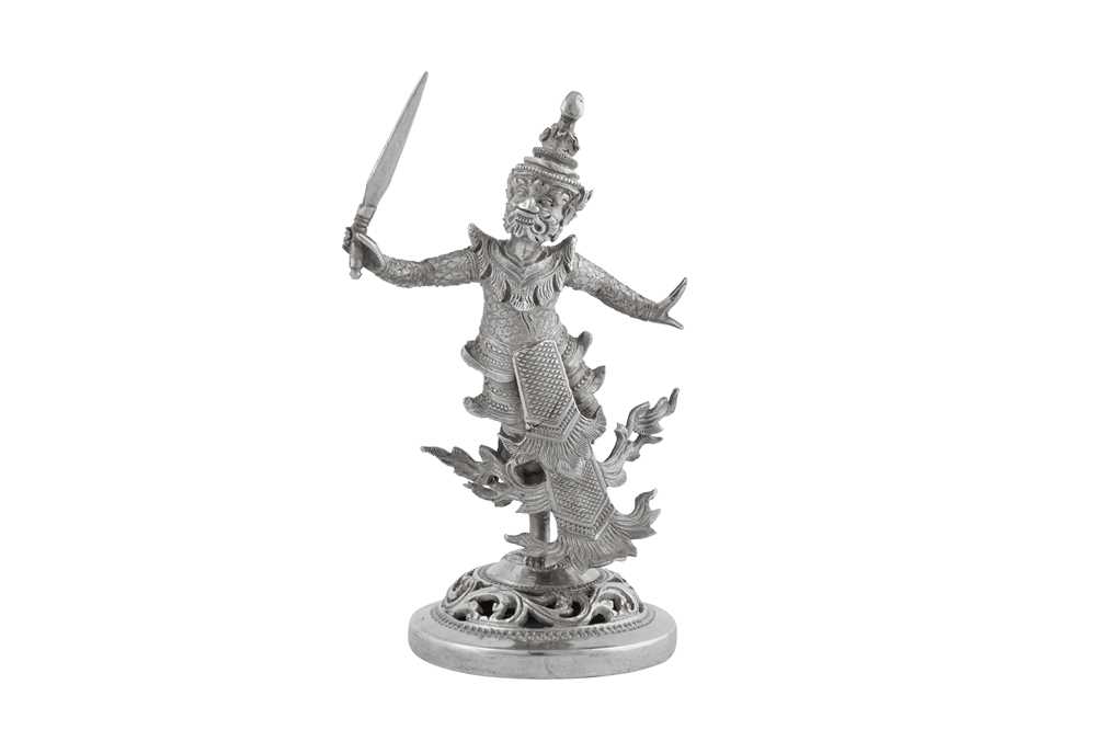 Lot 165 - A mid-20th century Burmese silver figure of Ravanna, Rangoon circa 1950