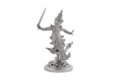 Lot 165 - A mid-20th century Burmese silver figure of Ravanna, Rangoon circa 1950