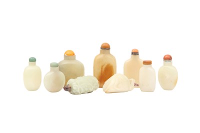 Lot 353 - NINE CHINESE PALE CELADON JADE SNUFF BOTTLES.