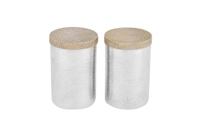 Lot 446 - A pair of Elizabeth II modernist parcel gilt sterling silver cannisters, London 1977 by Stuart Devlin (1931-2018)
