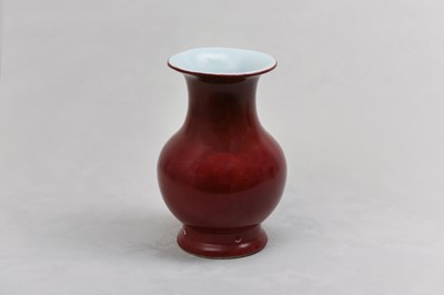 Lot 90 - A CHINESE RED-GLAZED VASE.