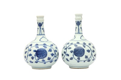 Lot 235 - A PAIR OF CHINESE BLUE AND WHITE VASES.