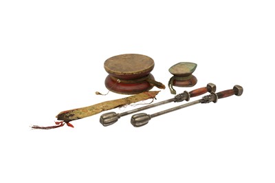 Lot 830 - TWO TIBETAN DRUMS, DAMARU AND A PAIR OF TIBETAN DRUMSTICKS.