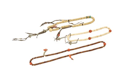 Lot 828 - λ  THREE TIBETAN NECKLACES, MALA.