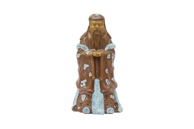 Lot 699 - A CHINESE ROBIN'S EGG GLAZED AND GILDED FIGURE OF A SCHOLAR.
