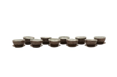 Lot 687 - A SET OF TEN CHINESE COCONUT CUPS AND SAUCERS.