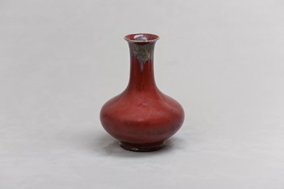 Lot 97 - A CHINESE RED-GLAZED BOTTLE VASE.