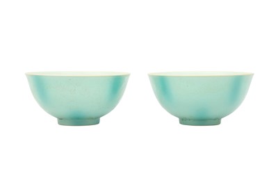 Lot 773 - A PAIR OF CHINESE GREEN-GLAZED INCISED 'DRAGON' BOWLS.