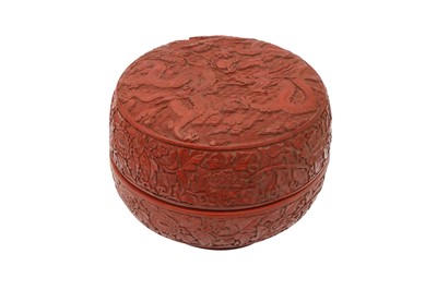 Lot 797 - A CHINESE CINNABAR LACQUER STYLE 'DRAGON' BOX AND COVER.