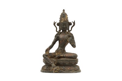 Lot 819 - A GILT-BRONZE FIGURE OF AVALOKITESHVARA.