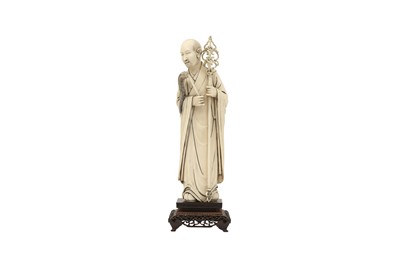 Lot 333 - A CHINESE IVORY FIGURE OF THE DOORMAN LOHAN.