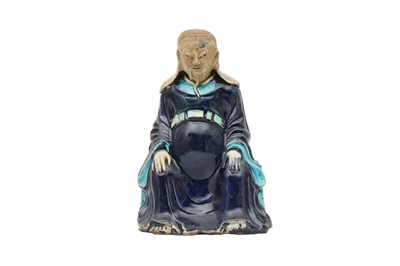 Lot 212 - A CHINESE FAHUA FIGURE.