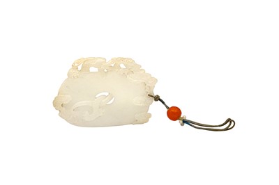 Lot 183 - A CHINESE WHITE JADE 'DRAGON' BI PENDANT.