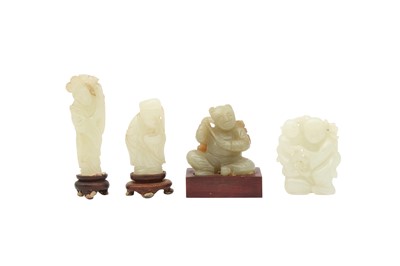 Lot 177 - A GROUP OF FOUR CHINESE PALE CELADON JADE FIGURES.