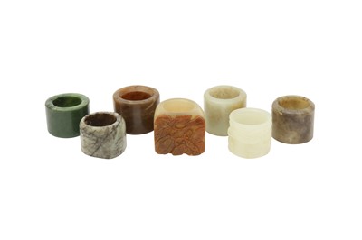 Lot 193 - A GROUP OF SEVEN JADE ARCHER'S RINGS.