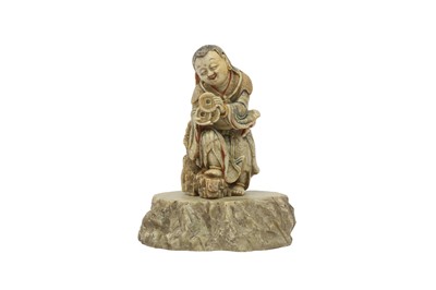 Lot 531 - A CHINESE SOAPSTONE FIGURE OF LIUHAI.