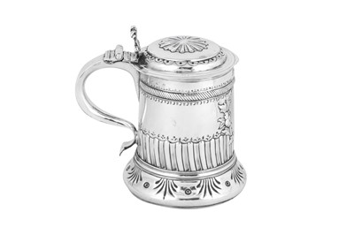 Lot 690 - A Charles II and Victorian sterling silver tankard, London 1683 probably by Alexander Roode, and London 1865 by Robert Harper