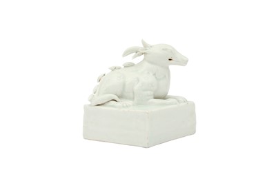Lot 689 - A CHINESE WHITE-GLAZED 'MYTHICAL BEAST' SEAL.