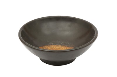 Lot 670 - A CHINESE BLACK-GLAZED 'LEAF' BOWL.