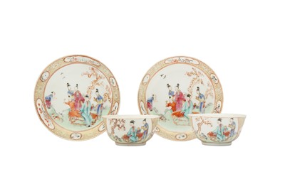 Lot 681 - A PAIR OF CHINESE FAMILLE ROSE CUPS AND SAUCERS.