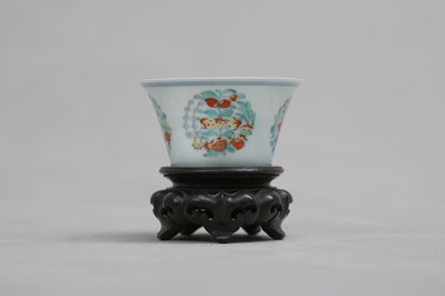 Lot 330 - A CHINESE DOUCAI CUP.