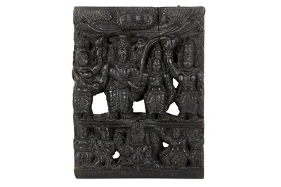 Lot 383 - A CARVED AND EBONISED WOODEN PANEL WITH HINDU GODS