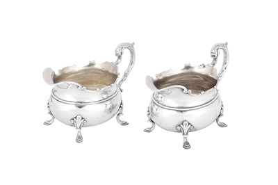 Lot 495 - A pair of Edwardian sterling silver sauceboats, London 1903 by R and W Sorely of Glasgow