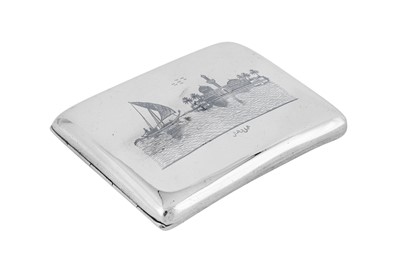 Lot 265 - An early to mid-20th century Iraqi silver and niello cigarette case, circa 1930-40