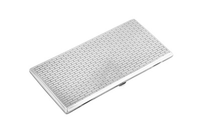 Lot 438 - A large George VI ‘Arts and Crafts’ sterling silver cigarette case, London 1939 by Omar Ramsden (1873-1939)