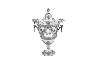 Lot 500 - An Edwardian sterling silver twin handled covered vase or cup, London 1907 by George Fox