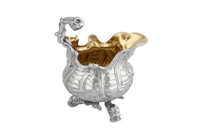 Lot 505 - A William IV sterling silver cast cream or milk jug, London 1833 by Joseph Angell I and John Angell I