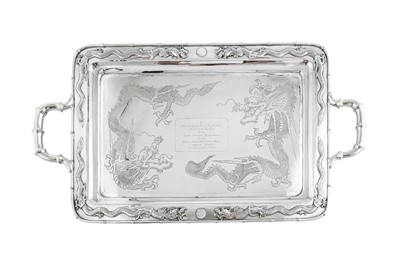 Lot 235 - An early 20th century Chinese Export silver three-piece tea service on a twin handled tray, Shanghai dated 1926 retailed by Zee Woo