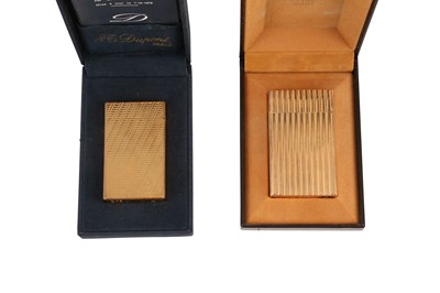Lot 64 - TWO ST DUPONT GOLD PLATED LIGHTERS, 20TH CENTURY