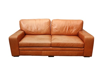 Lot 397 - A CONTEMPORARY TAN LEATHER THREE SEATER SOFA