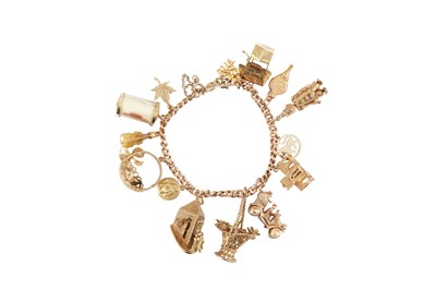 Lot 212 - A charm bracelet
