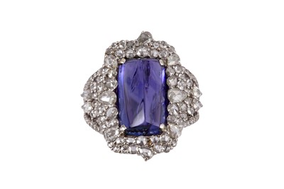 Lot 241 - A TANZANITE AND DIAMOND DRESS RING