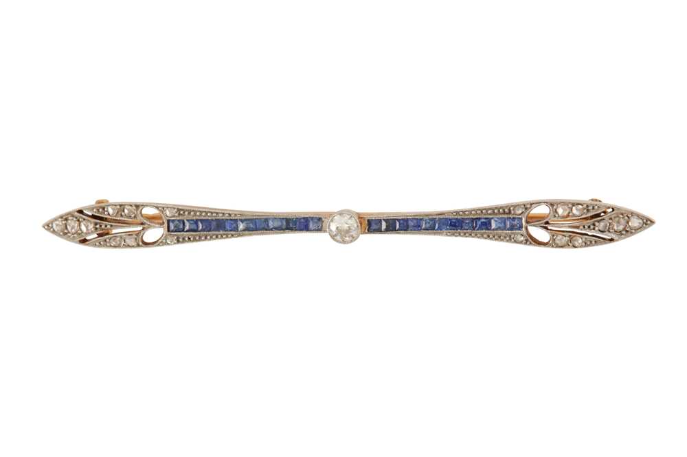 Lot 34 - A diamond and sapphire brooch