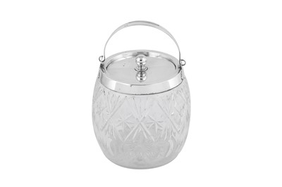 Lot 485 - An Edwardian sterling silver mounted glass biscuit barrel, Birmingham 1906 by John Grinsell & Sons