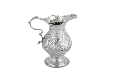 Lot 454 - A George II sterling silver cream jug, London 1751 by Samuel Meriton I (first reg. 10th May 1739)