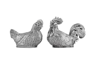 Lot 64 - A pair of early 20th century German 800 standard silver novelty pepperettes, circa 1930